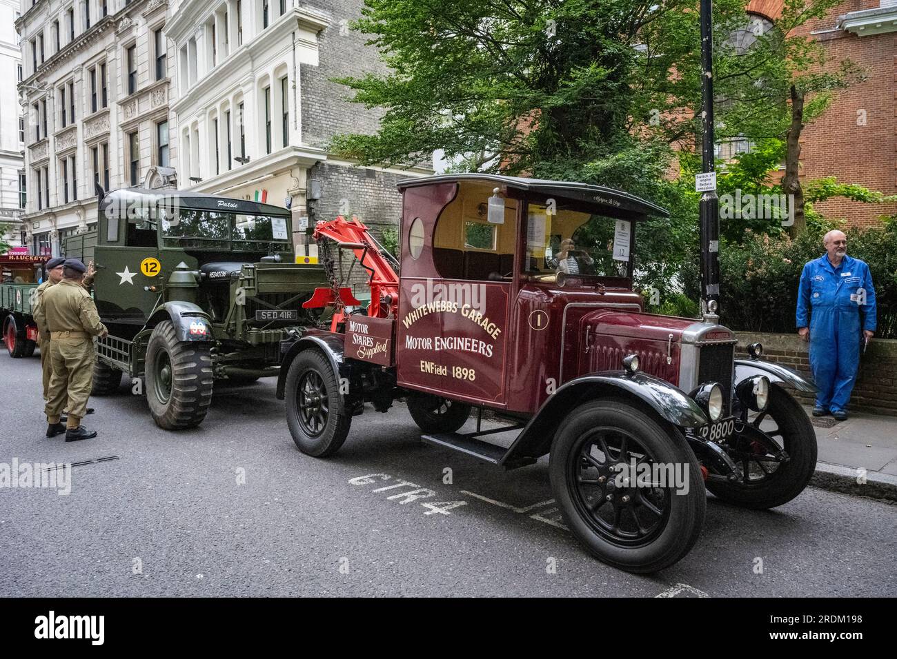 London, UK.  22 July 2023. Traditional vehicles parked up ahead of taking part in the Cart Marking ceremony in Guildhall Yard.  The event dates back over 750 years to the early days of The City of London with the regulation of horse and carts.  Sheriffs, the Master Carman,  two Wardens and the Master Glover, dressed in traditional robes, brand each vehicle with a red-hot iron, a ritual known as Cart Marking. Credit: Stephen Chung / Alamy Live News Stock Photo
