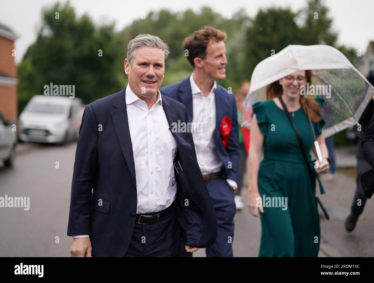 Labour leader Sir Keir Starmer (left) and deputy Labour Party leader Angela Rayner with Labour candidate Alistair Strathern (centre) during a visit to Shefford in the constituency of Mid Bedfordshire, where the sitting MP is former culture secretary Nadine Dorries, ahead of a potential by-election. Picture date: Saturday July 22, 2023. Stock Photo