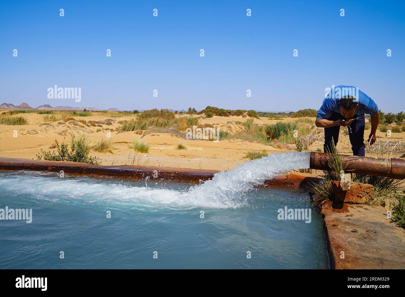 A man seen washing his face at the El Heiz Water Education Centre