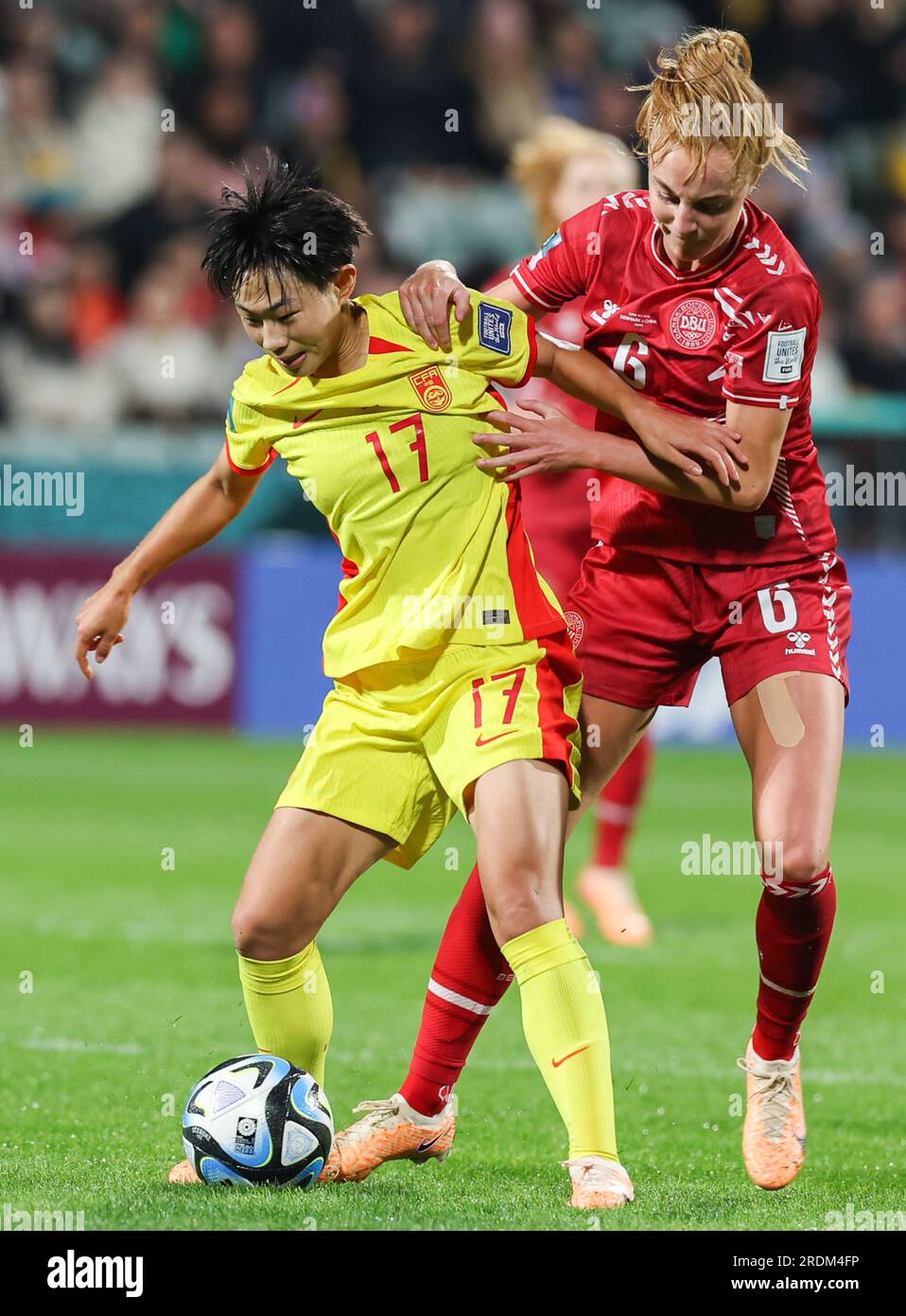 Perth, Australia. 22nd July, 2023. Wu Chengshu (L) of China vies with Karen Holmgaard of Denmark during the group D match between Denmark and China at the 2023 FIFA Women's World Cup in Perth, Australia, July 22, 2023. Credit: Ding Ting/Xinhua/Alamy Live News Stock Photo