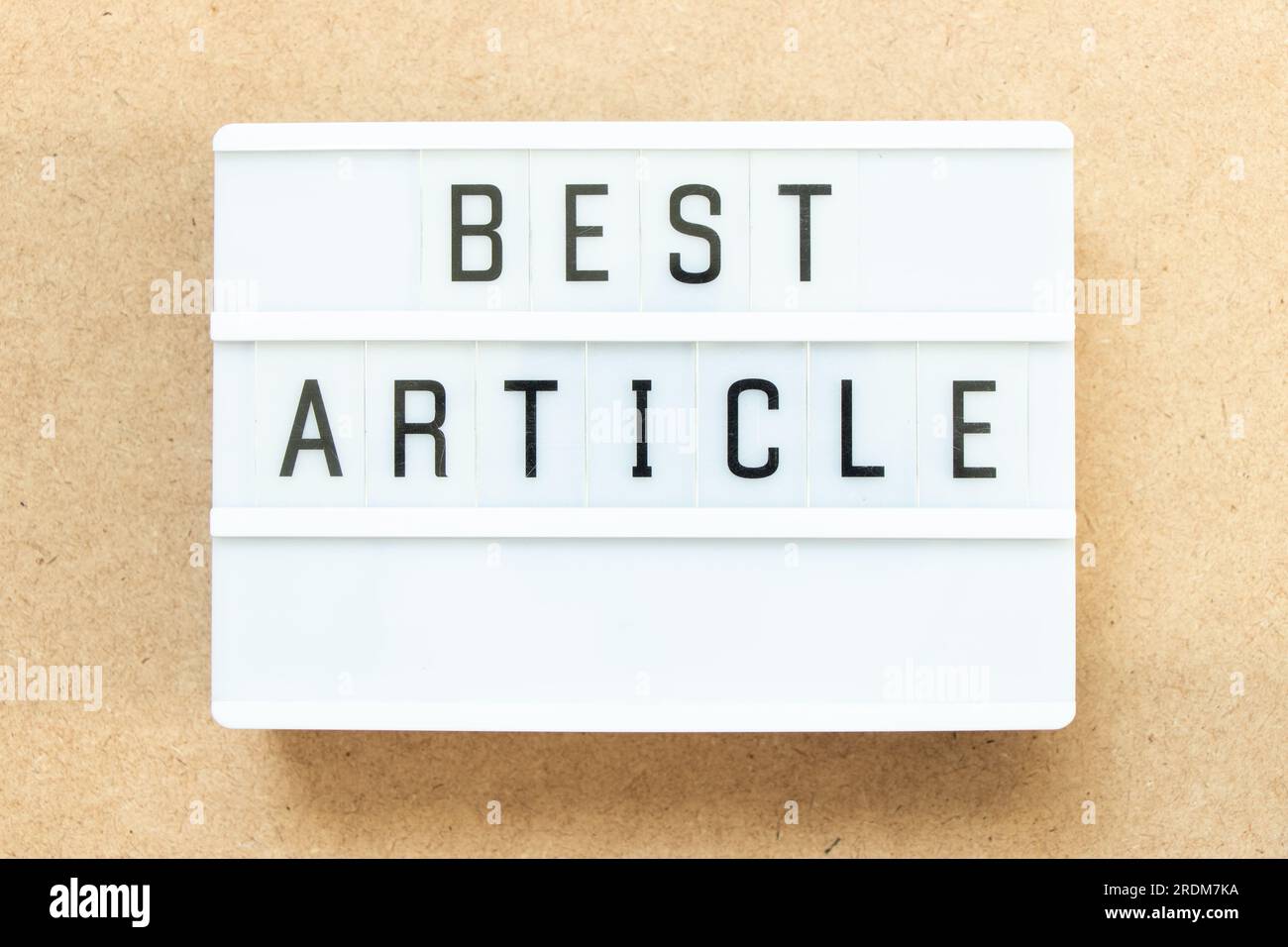 Lightbox with word best article on wood background Stock Photo