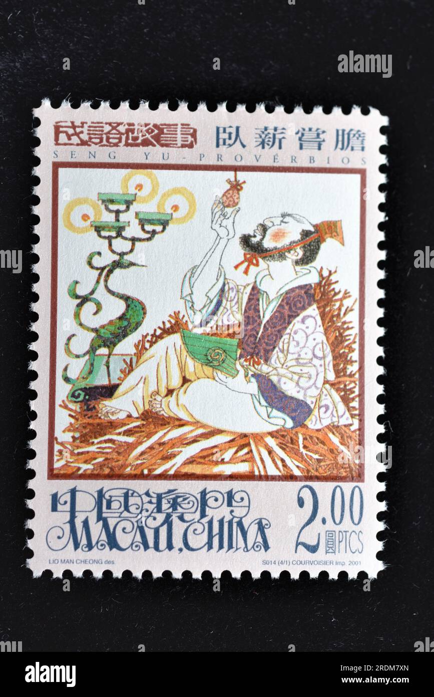 MACAU - CIRCA 2001: A stamps printed in Macao shows Seng Yu Idioms - Sleeping on Brushwood and Tasting Gallbladder,circa 2001 Stock Photo