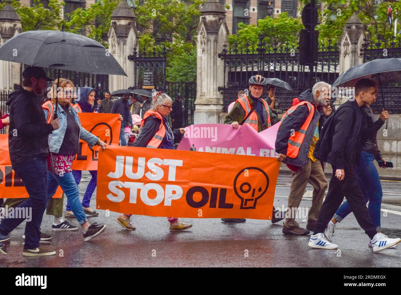 London, England, UK. 22nd July, 2023. Just Stop Oil activists walk in