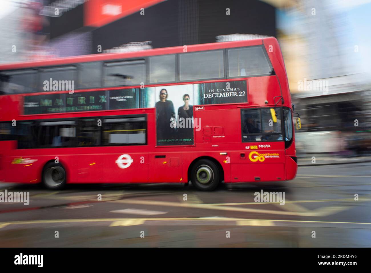 Red London bus panning with motion blur. Stock Photo