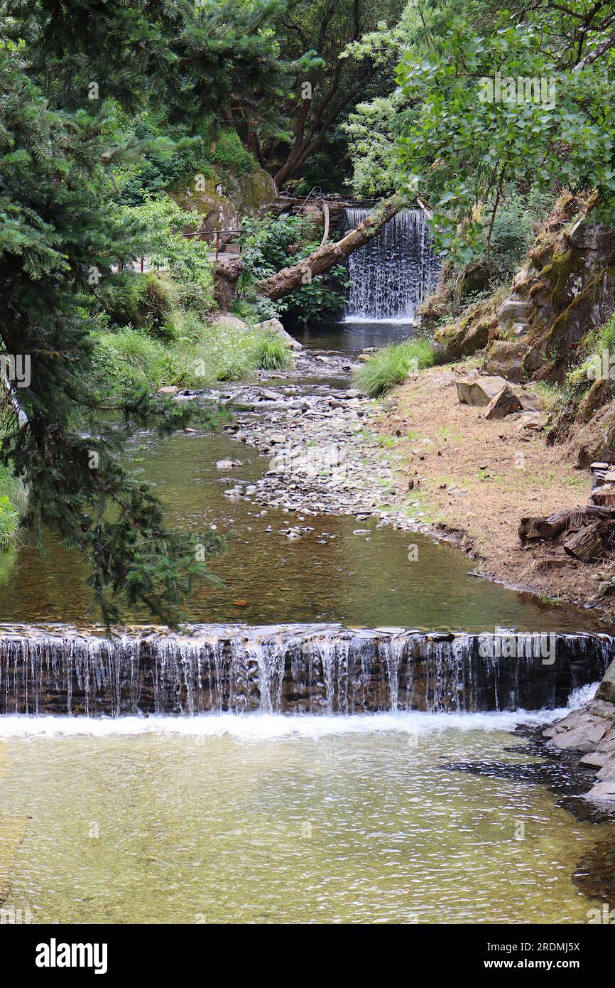 Small river with two waterfalls, flowing through nature. Ribeira de São