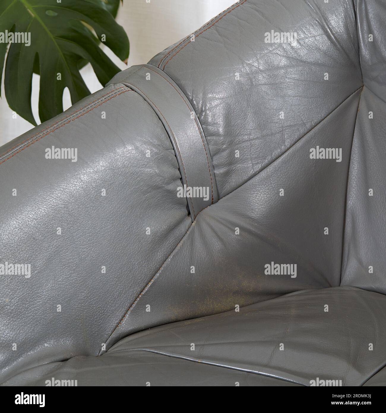 Grey leather lounge chairs. Midcentury vintage living room furniture