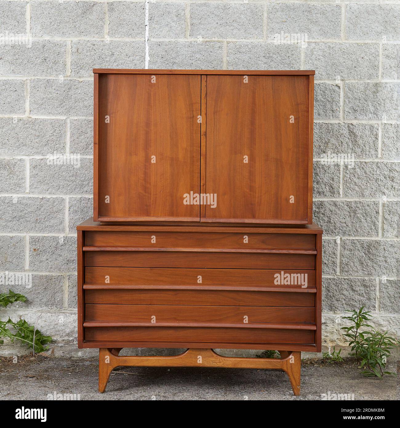 Stunning Midcentury Modern high dresser. 1960s vintage curved wood furniture Stock Photo Alamy