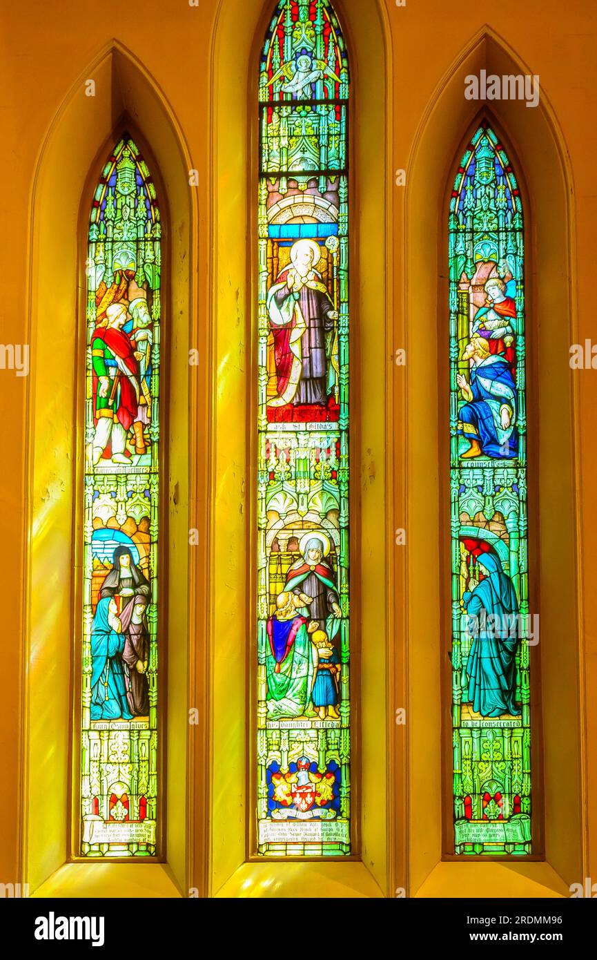 Toronto, Canada - July 19, 2023: The Cathedral Church of St. James. Religion symbols in stained glass window in the lateral wall. Stock Photo