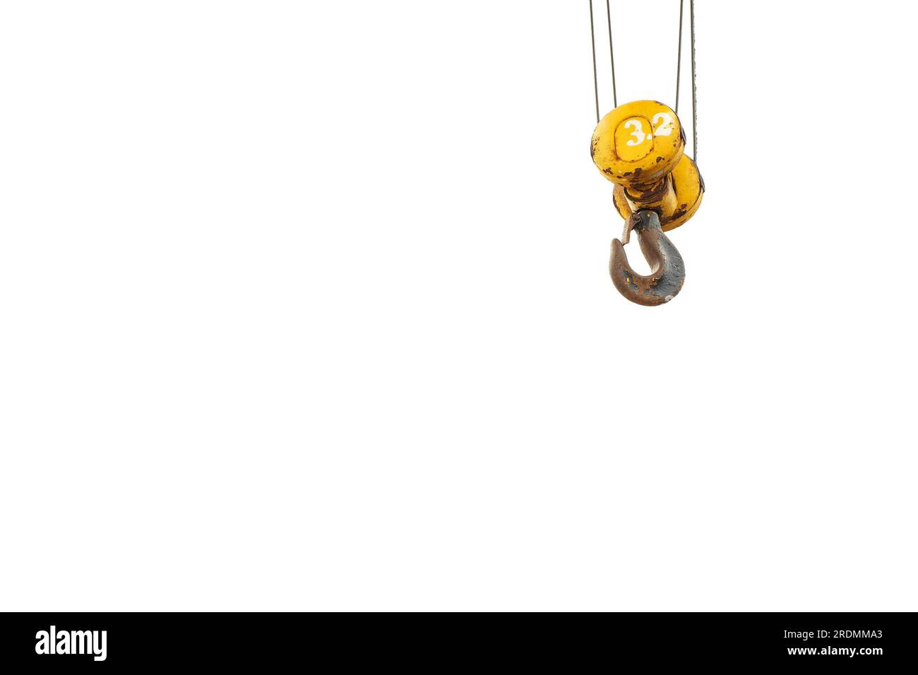 A crane hook with marked SWL - safe working load; building site safety regulations. Stock Photo