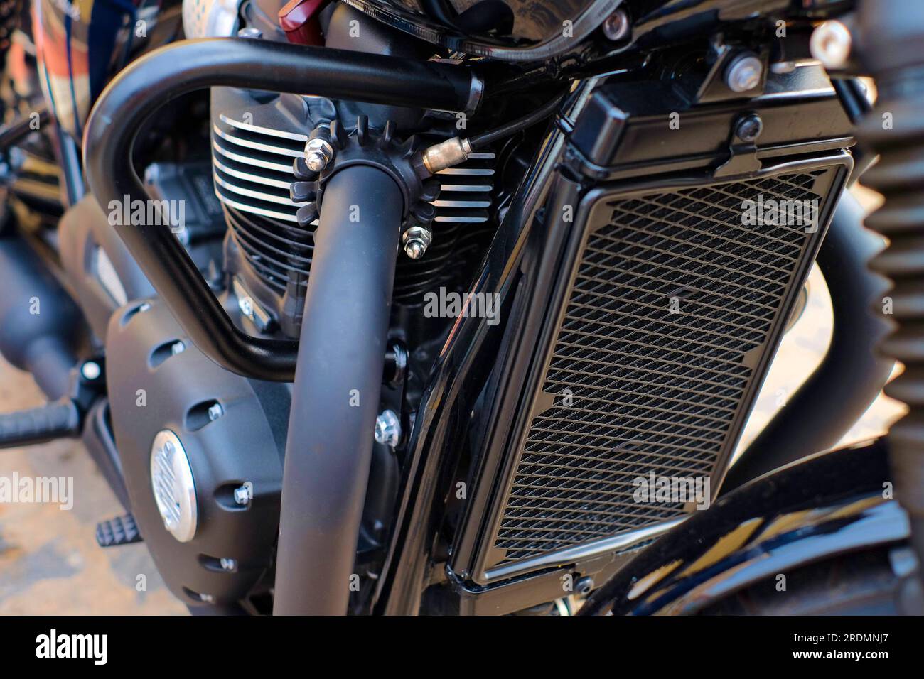 Details of a classic motorbike, heat exchanger, exhaust and frame. Stock Photo