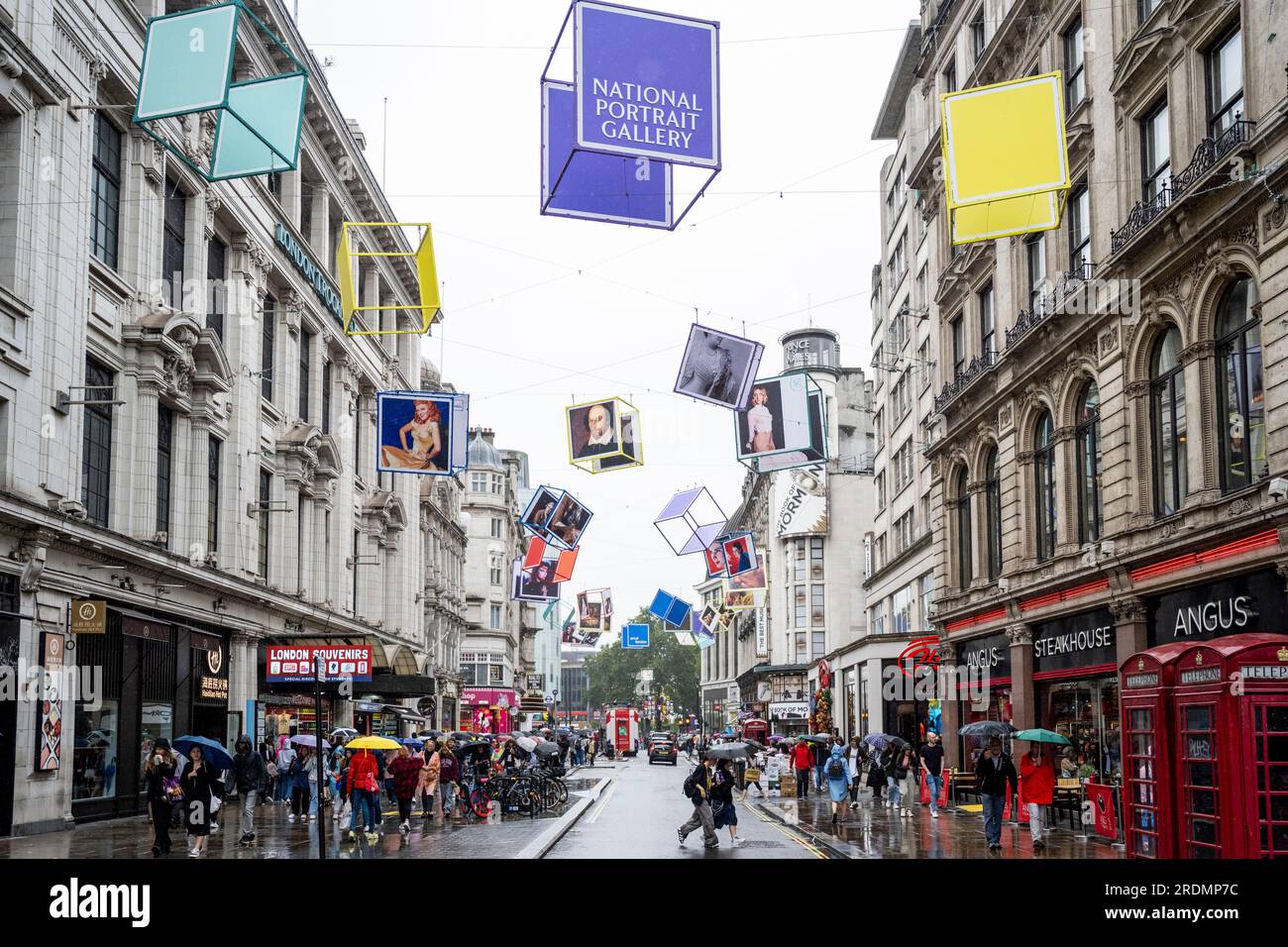 London, UK. 22 July 2023. Decorated cubes hang overhead in Coventry Street, just off Leicester