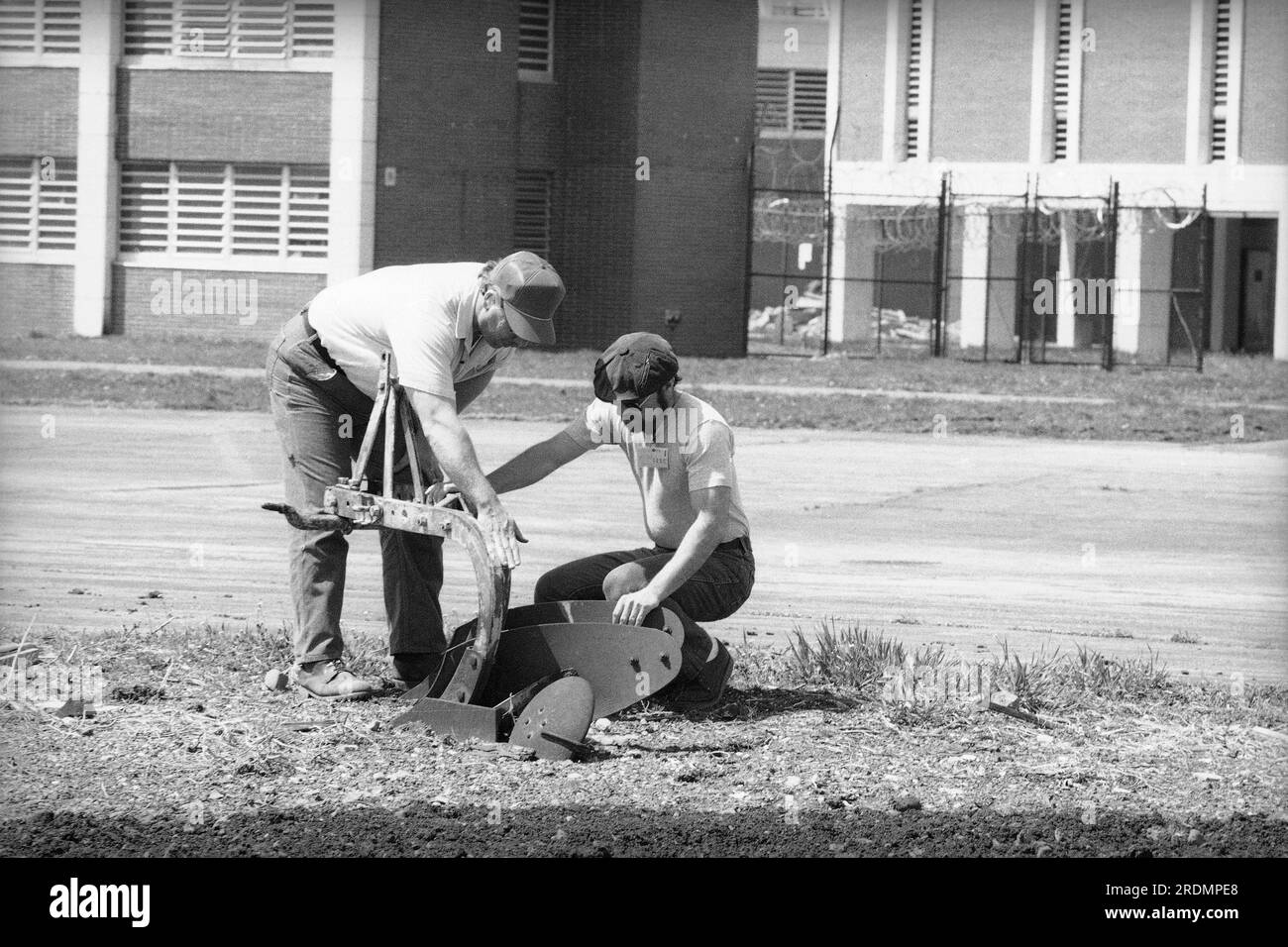 Rikers Island jail corrections officer Robert Orlandi, left, and