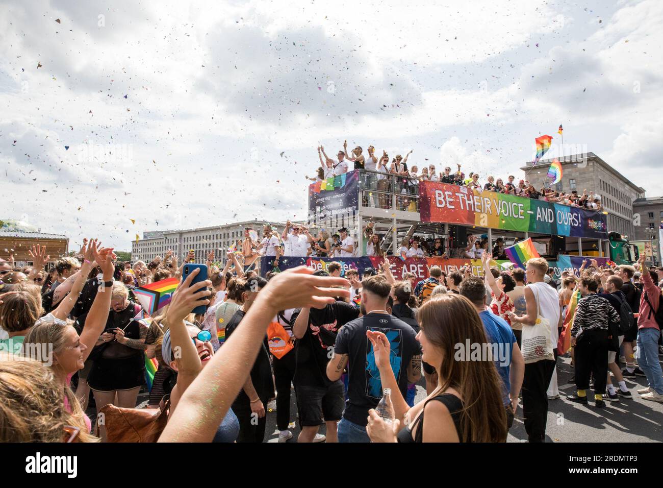 July 22, 2023, Berlin, Germany: On July 22, 2023, the city of Berlin was awash with color and camaraderie as it celebrated Christopher Street Day (CSD), also known as Berlin Pride. Thousands of individuals from diverse backgrounds gathered to participate in this vibrant event, marching from Leipziger Strasse to the iconic Brandenburg Gate. The air was filled with a sense of unity and pride as participants donned a spectrum of colorful costumes and waved rainbow flags, a universal symbol of support for the LGBTQ  community.However, the event was more than just a celebration. It served as a pla Stock Photo