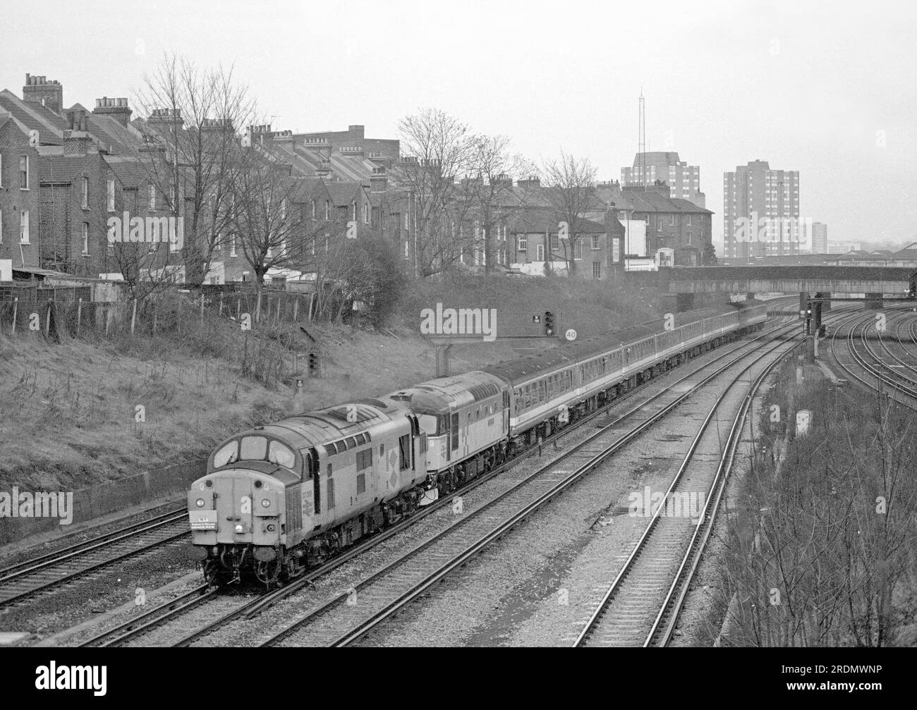 A pair of diesel locomotives numbers 37009 and 33050 working an enthusiast railtour at Clapham Junction on the 19th January 1992. Stock Photo