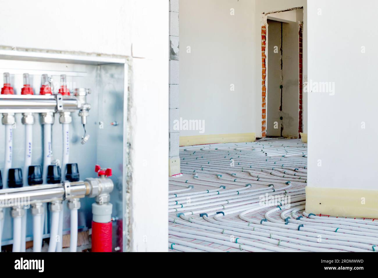 Install system Manifold Assembly of underfloor heating at home Stock