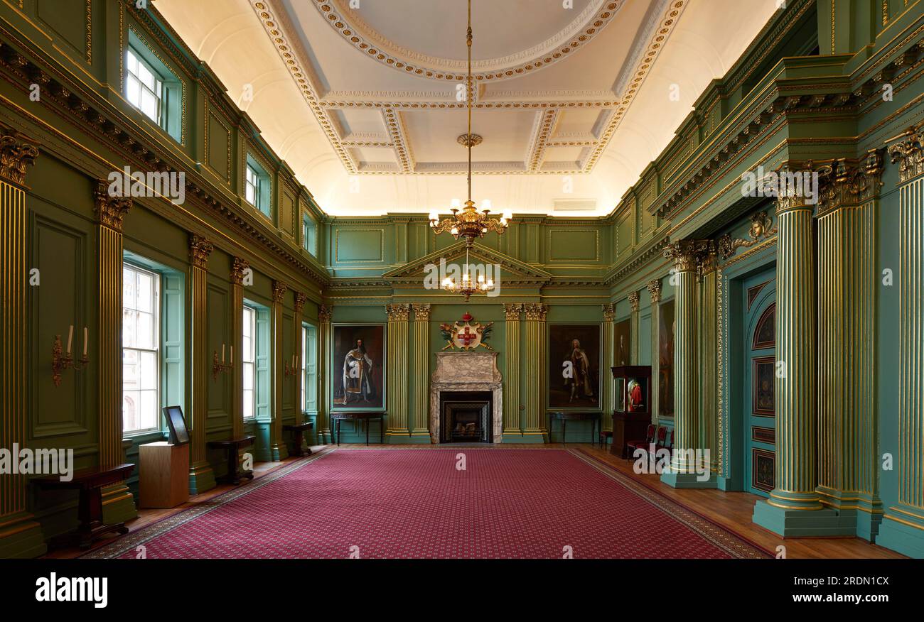 Stateroom painted in green with elaborate plaster work. York Mansion House, York, United Kingdom. Architect: De Matos Ryan, 2018. Stock Photo