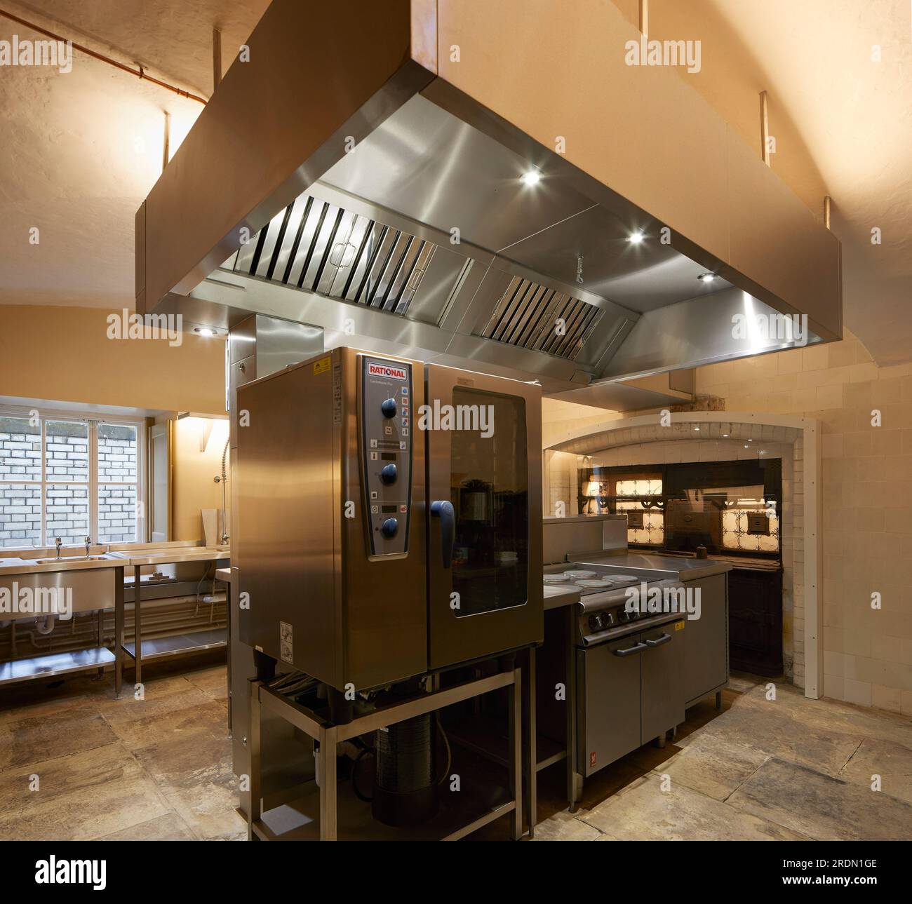 Modern kitchen with extraction hood. York Mansion House, York, United Kingdom. Architect: De Matos Ryan, 2018. Stock Photo