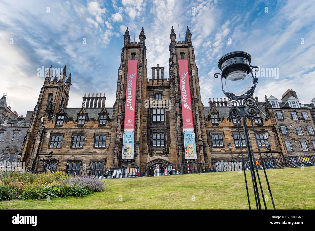 Assembly on the Mound historic building during Fringe Festival with old fashioned streetlight, Edinburgh, Scotland, UK Stock Photo