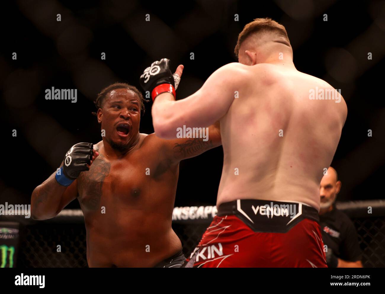 Jamal Pogues (left) and Mick Parkin in action during their heavyweight ...