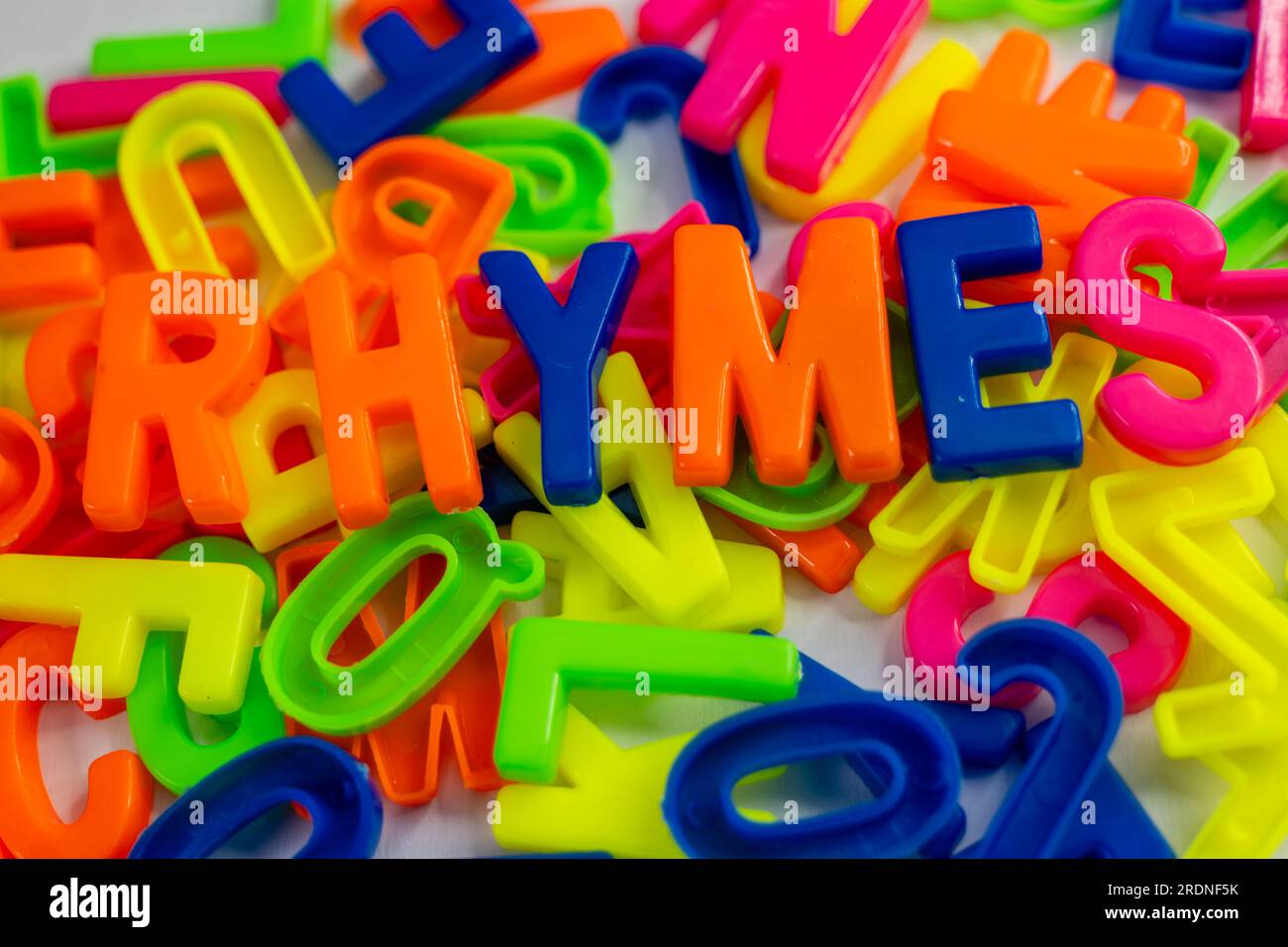 This stock image shows a group of colorful letter spelling out