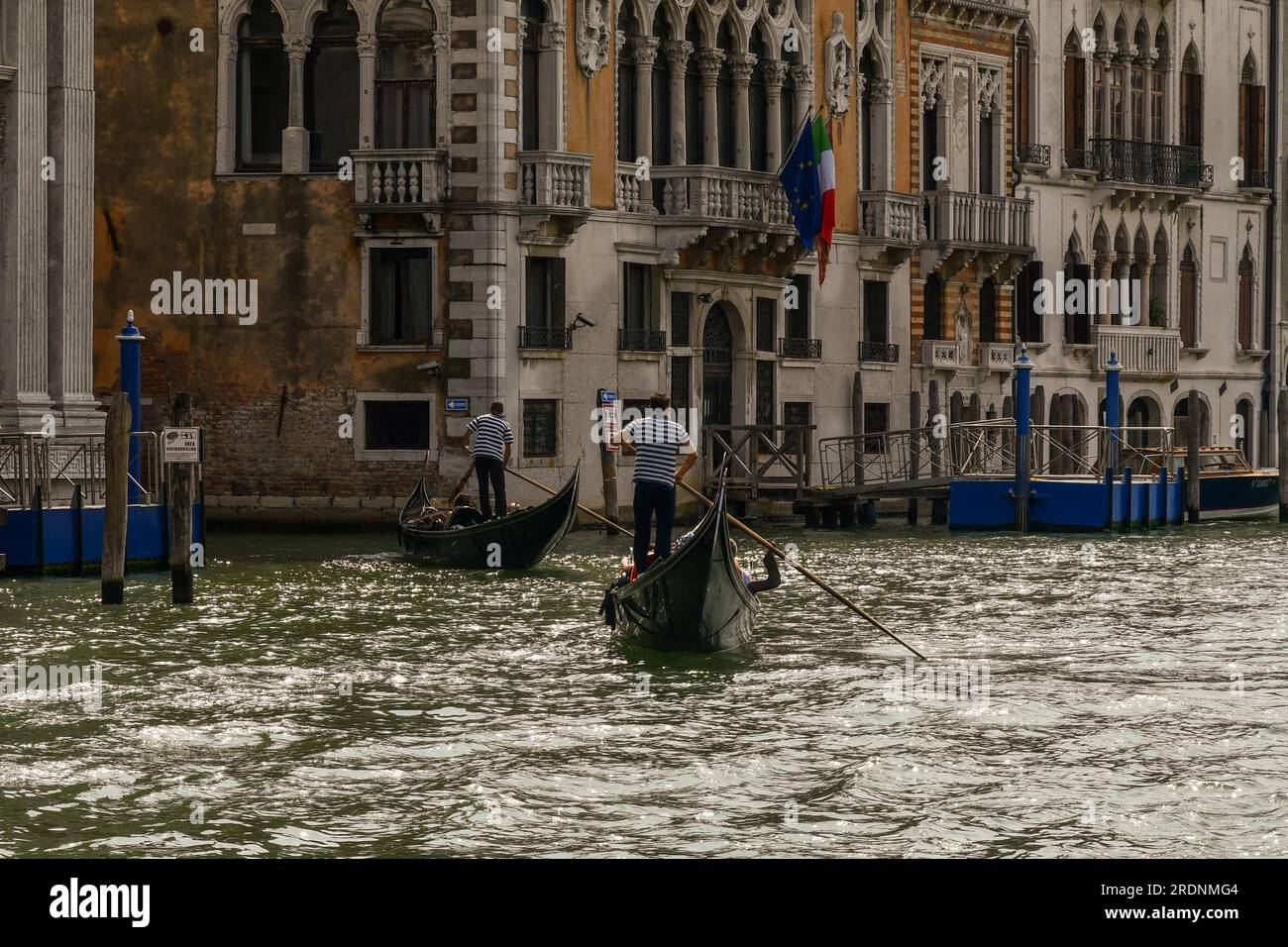 Gondola rides on the Grand Canal in front of Palazzo Corner Contarini