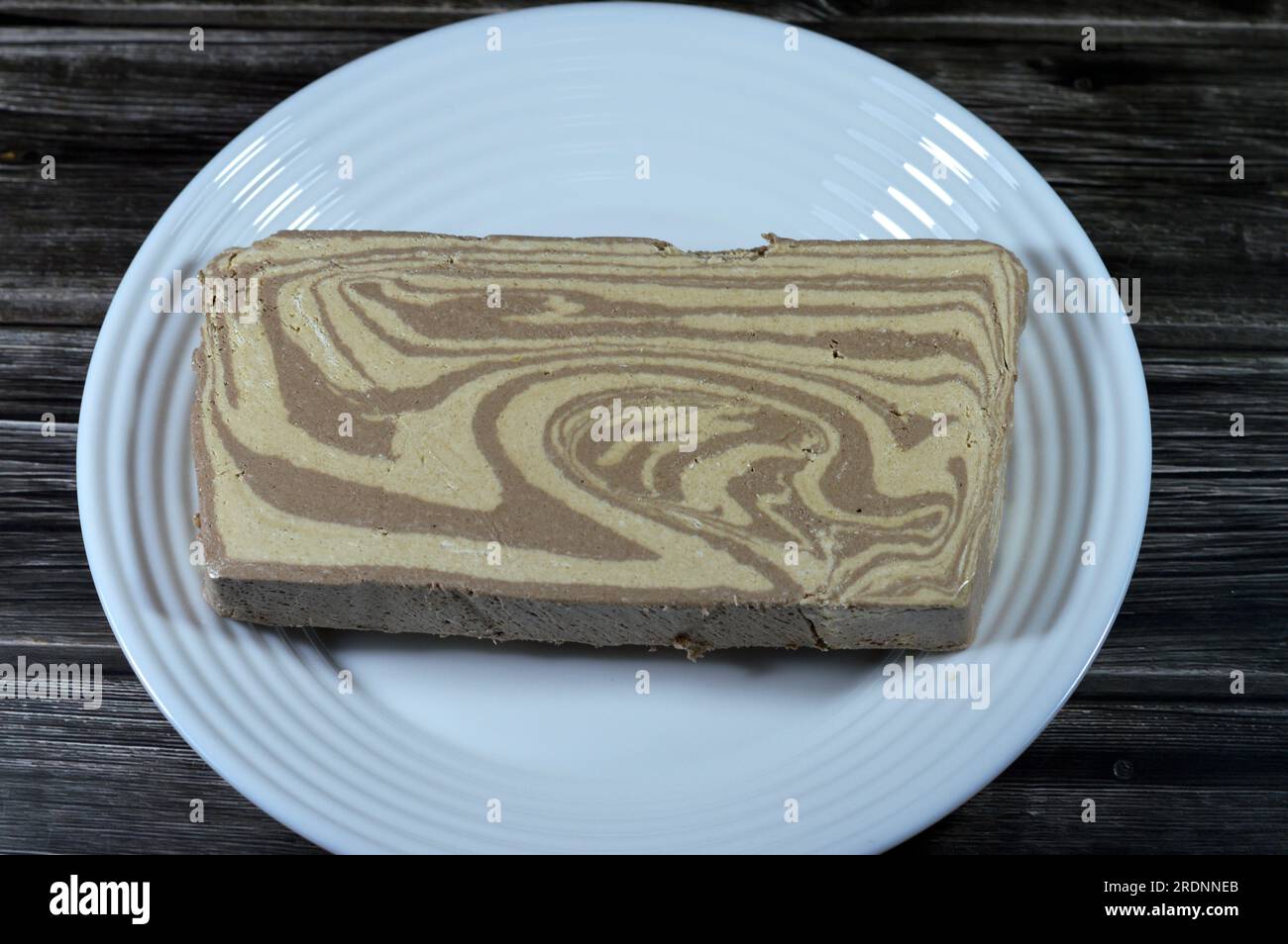 Traditional tahini halva with chocolate or Halawa Tahiniya, the primary