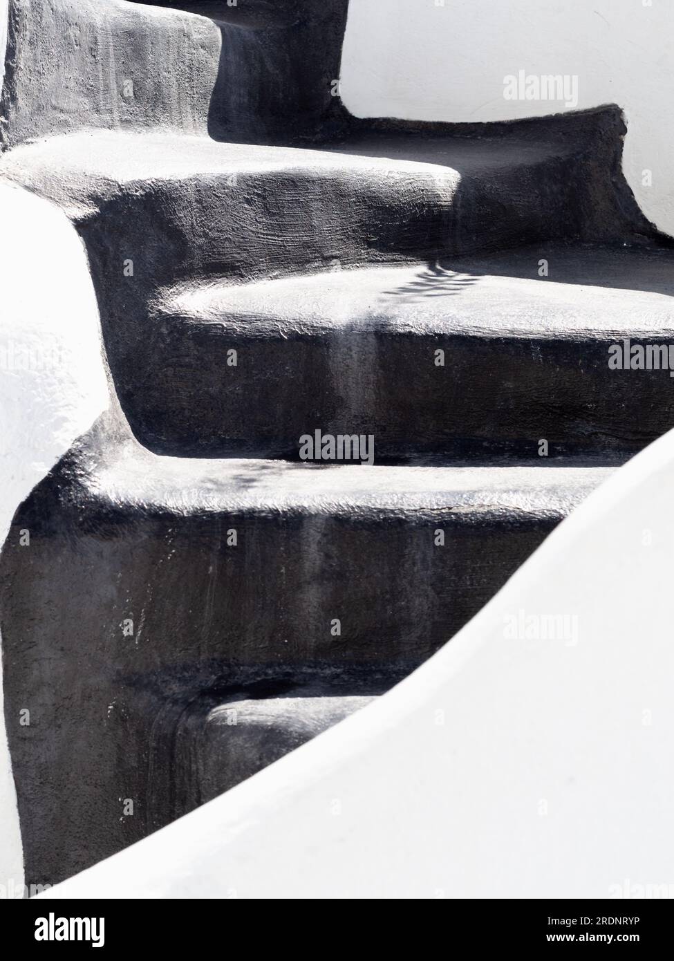 black and white stone steps in the sunlight, greek stairs, steep steps, beautiful details of