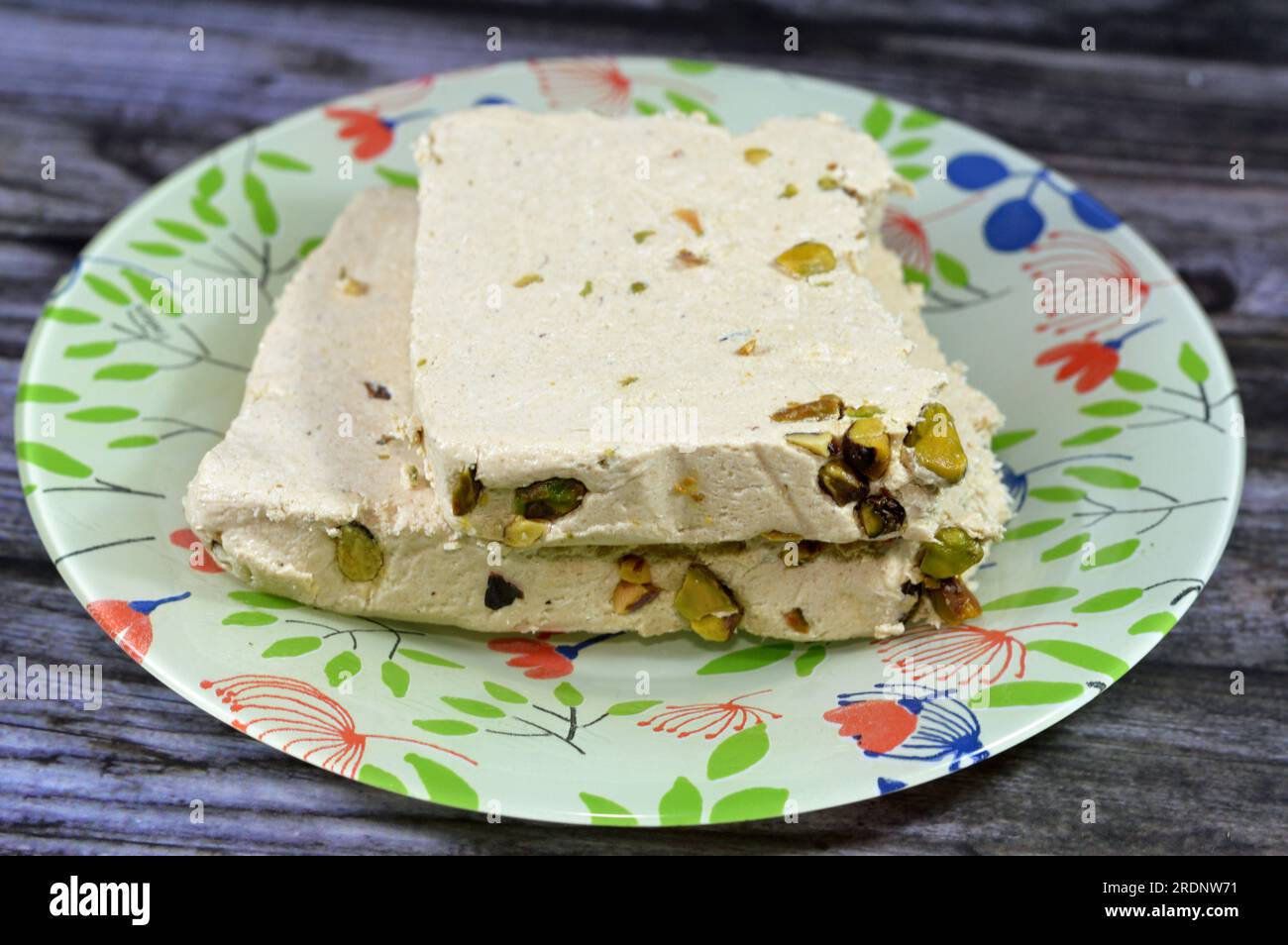 Traditional tahini halva with pistachios or Halawa Tahiniya, the