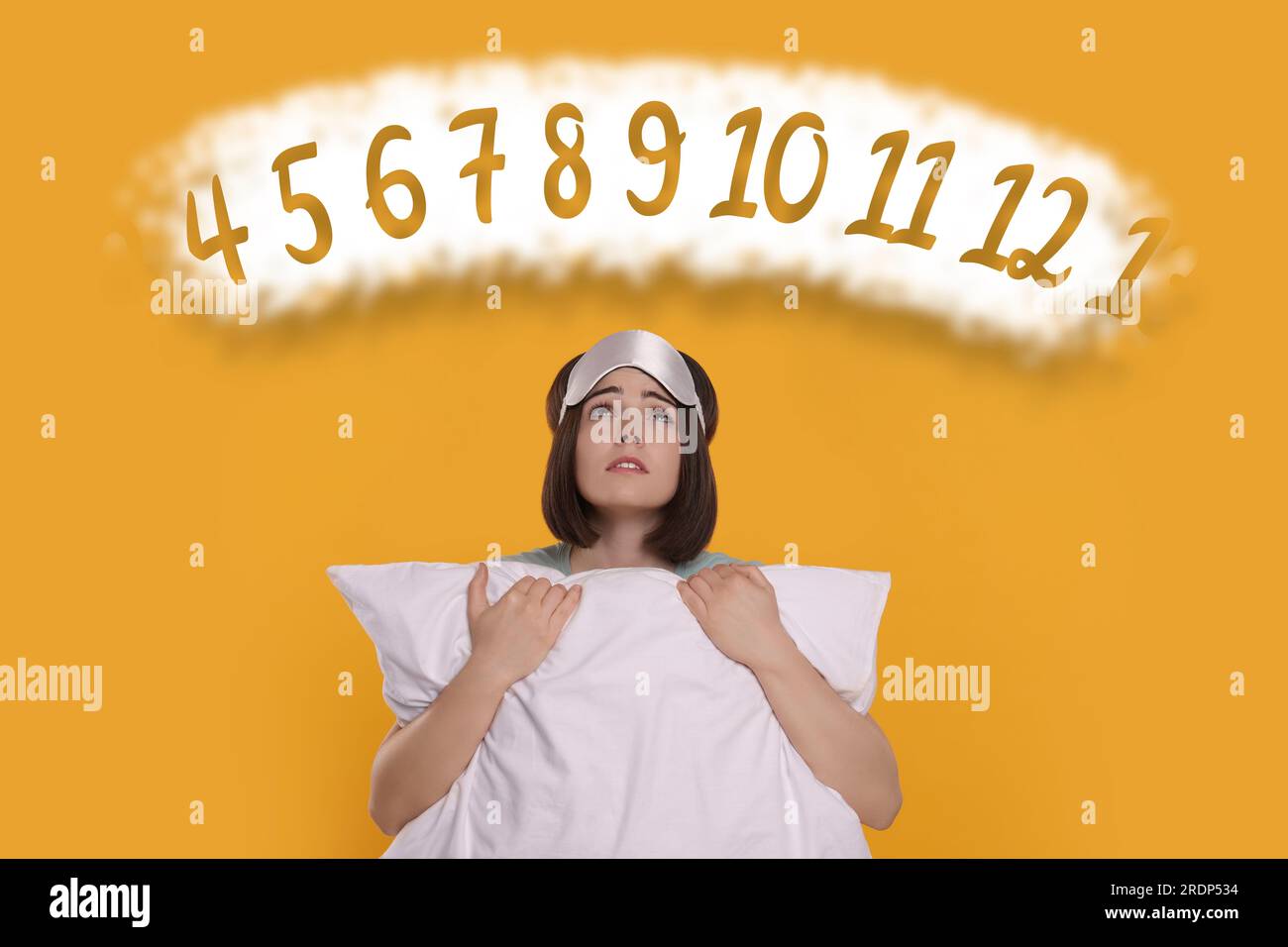 Insomnia. Exhausted woman with pillow counting to fall asleep on orange
