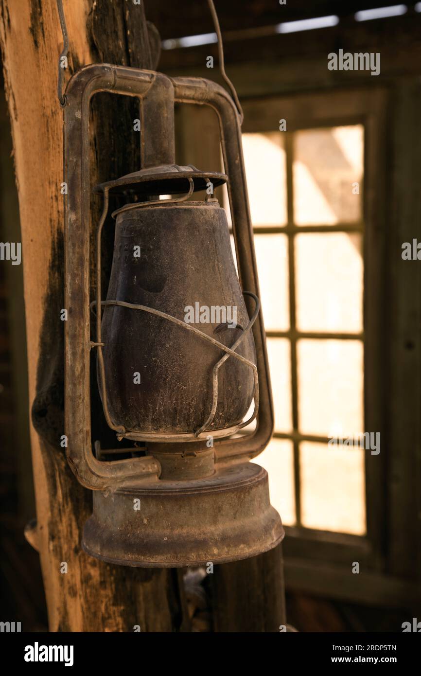 A dusty old latern hangs in an old building on display at the Little Hollywood Movie Museum in Kanab, Utah. Stock Photo
