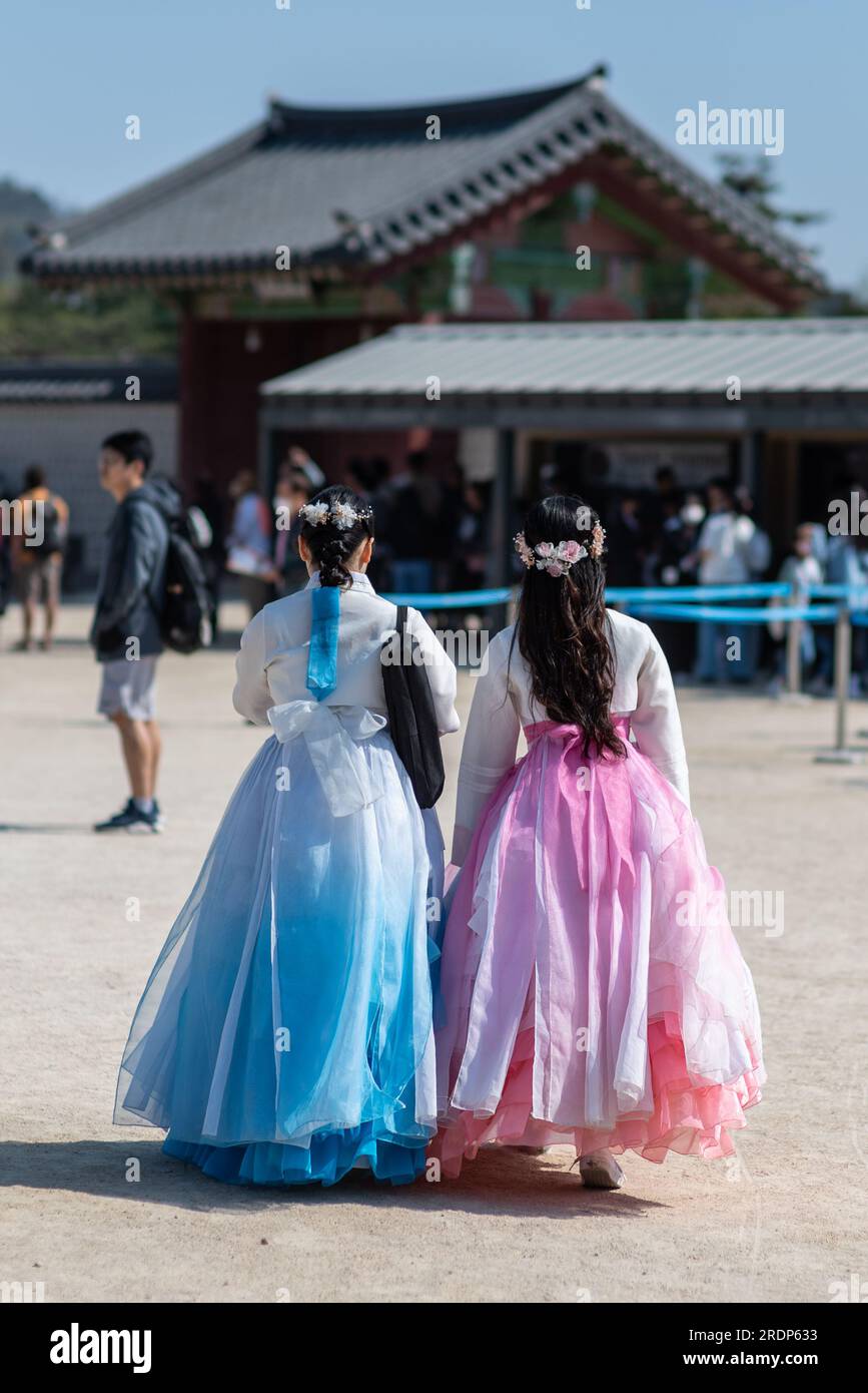 Pretty Korean girls wearing traditional Hanbok dress in Seoul