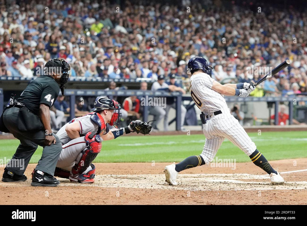 Milwaukee Brewers' Sal Frelick hits an RBI single during the sixth