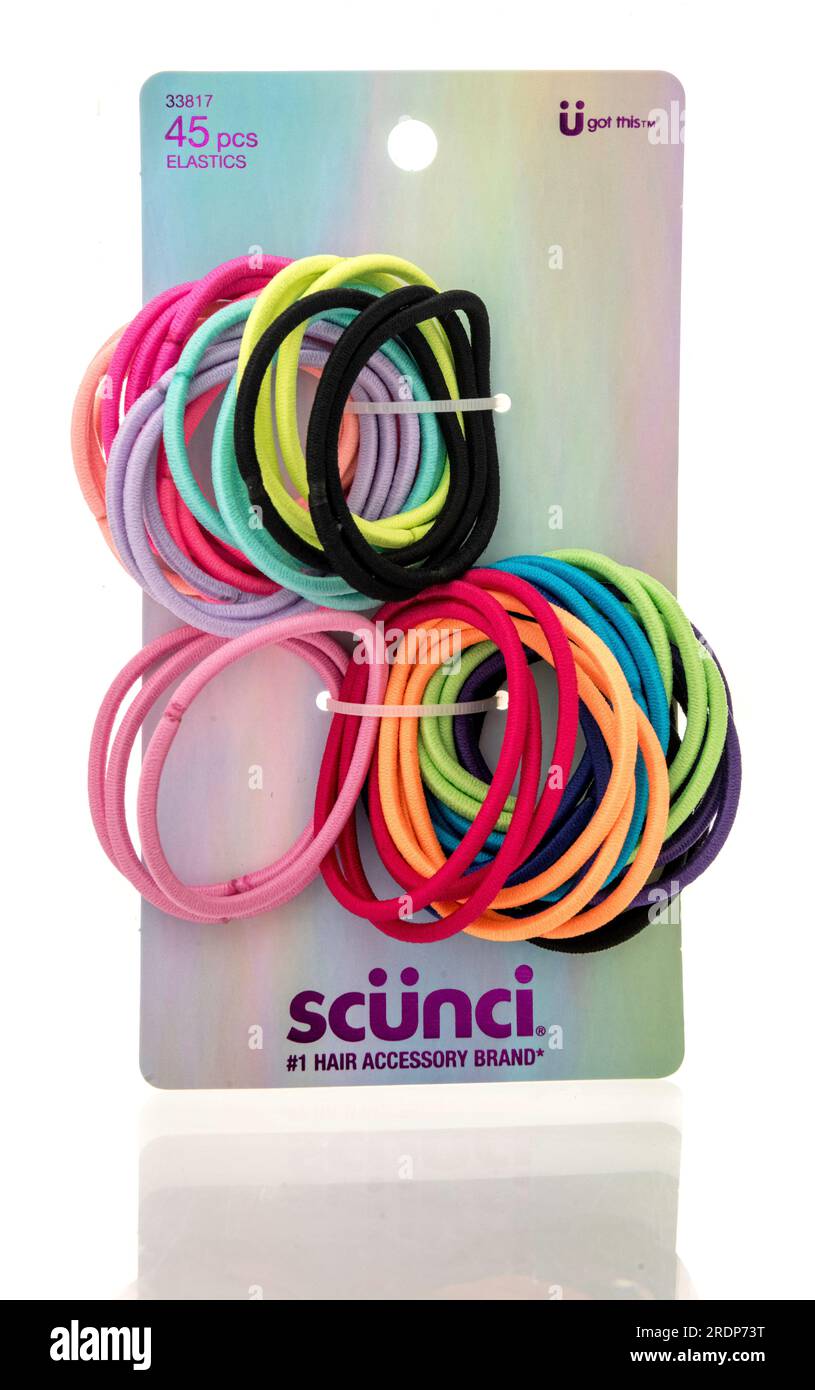 Winneconne, WI - 23 July 2023:  A package of Scunci elastic hair bands on an isolated background Stock Photo
