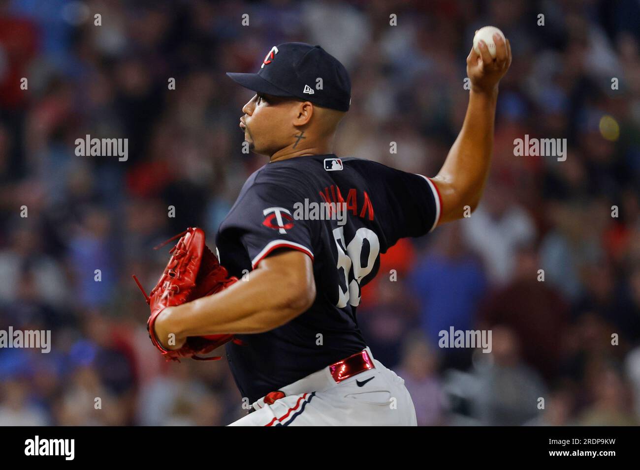 Minnesota Twins relief pitcher Jhoan Duran fields a ground ball during the  eighth inning of a baseball game between the Baltimore Orioles and the  Minnesota Twins, Sunday, July 2, 2023, in Baltimore.