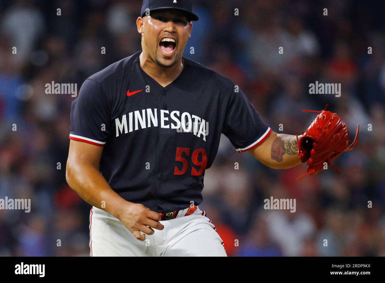 Minnesota Twins relief pitcher Jhoan Duran celebrates after a win over