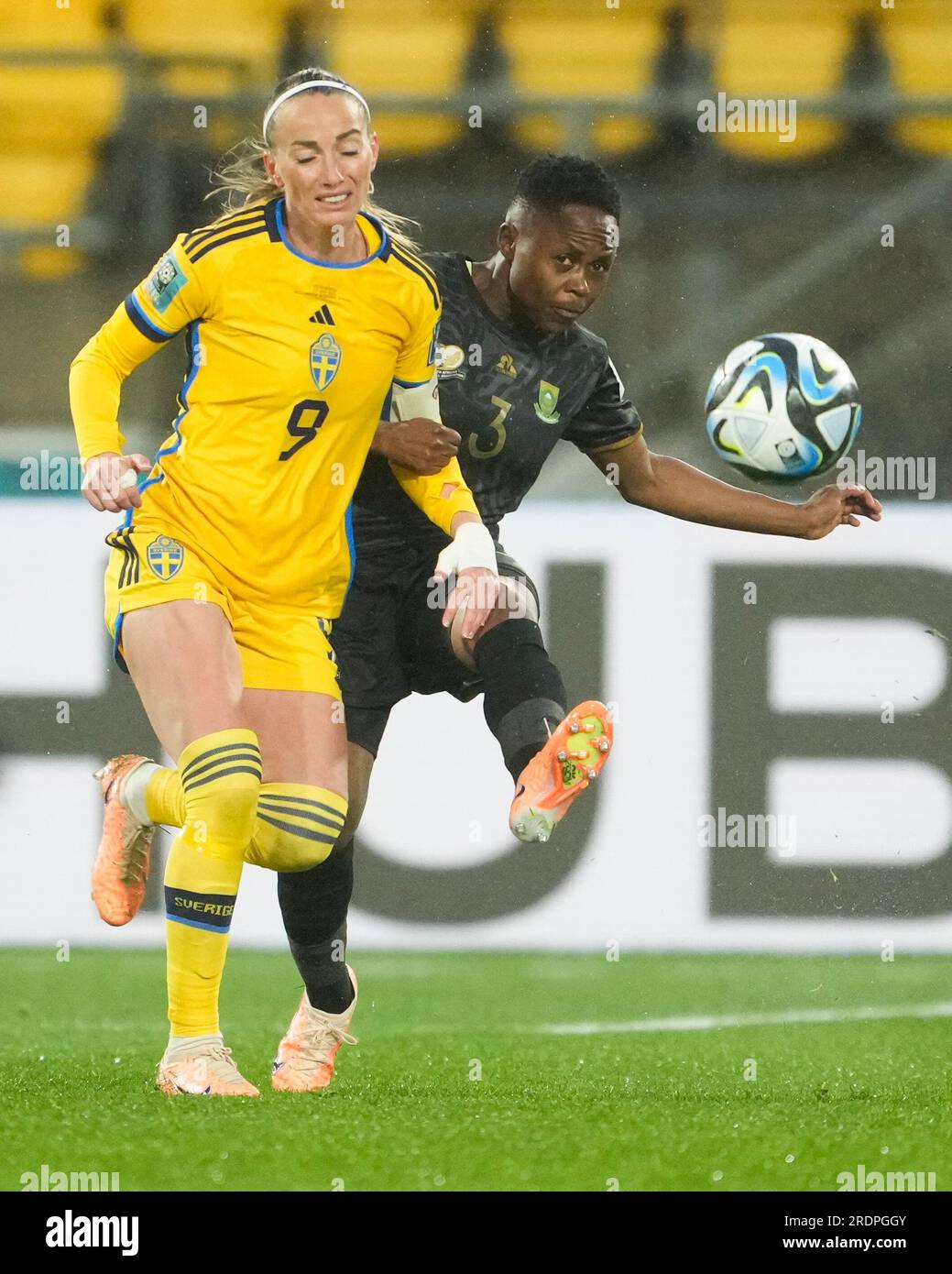South Africa's Bongeka Gamede, right, kicks the ball past Sweden's