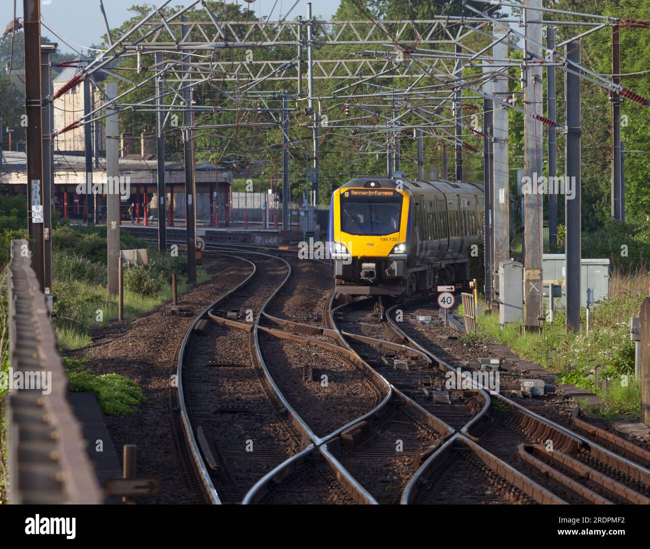 Northern Rail class 195 train departing from Lancaster railway station