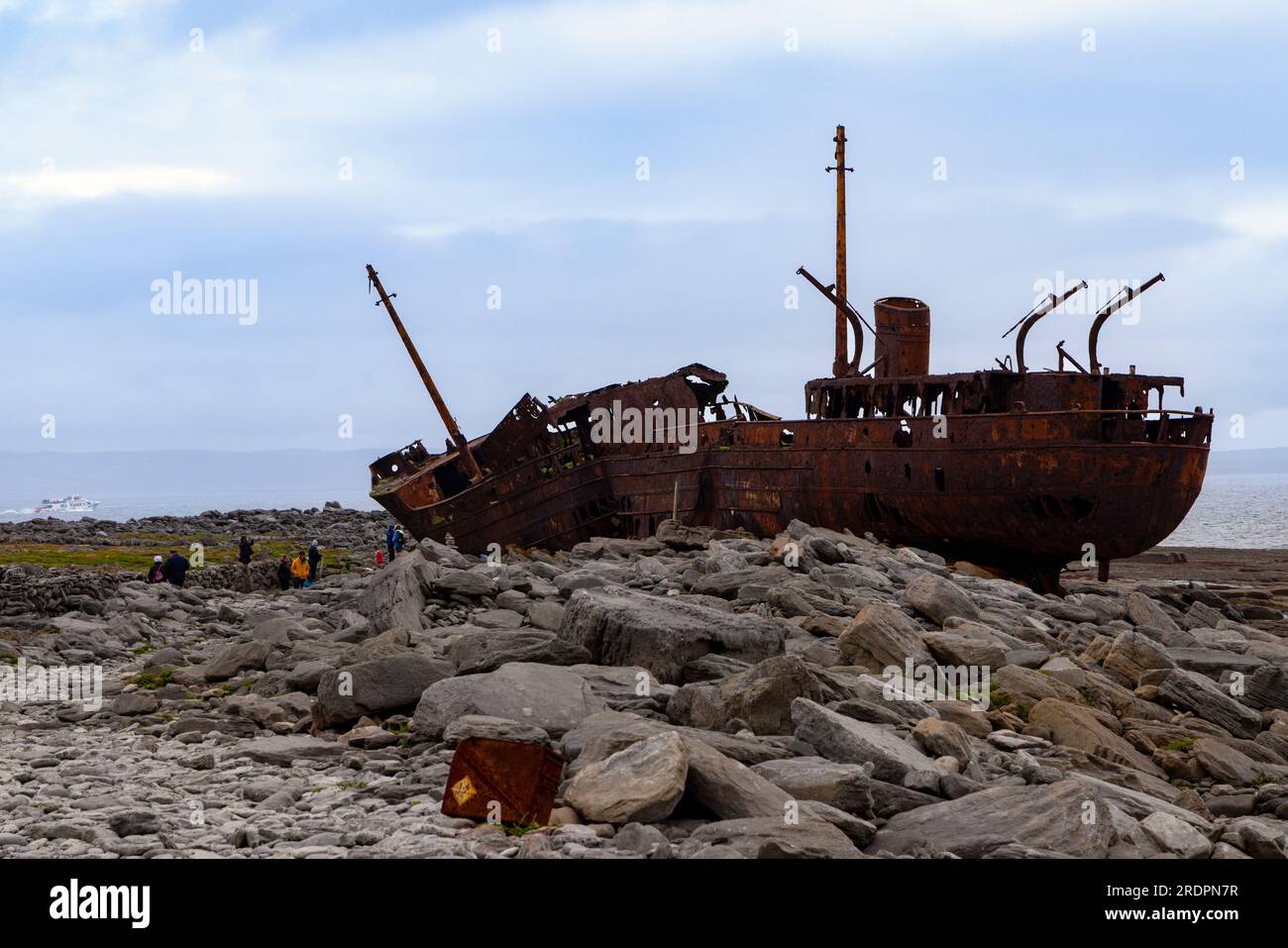 The rusty shipwreck of MV Plassey on Finnis Rock, Inis Oirr or Inisheer, one of the three Aran Islands, Republic of Ireland. Stock Photo