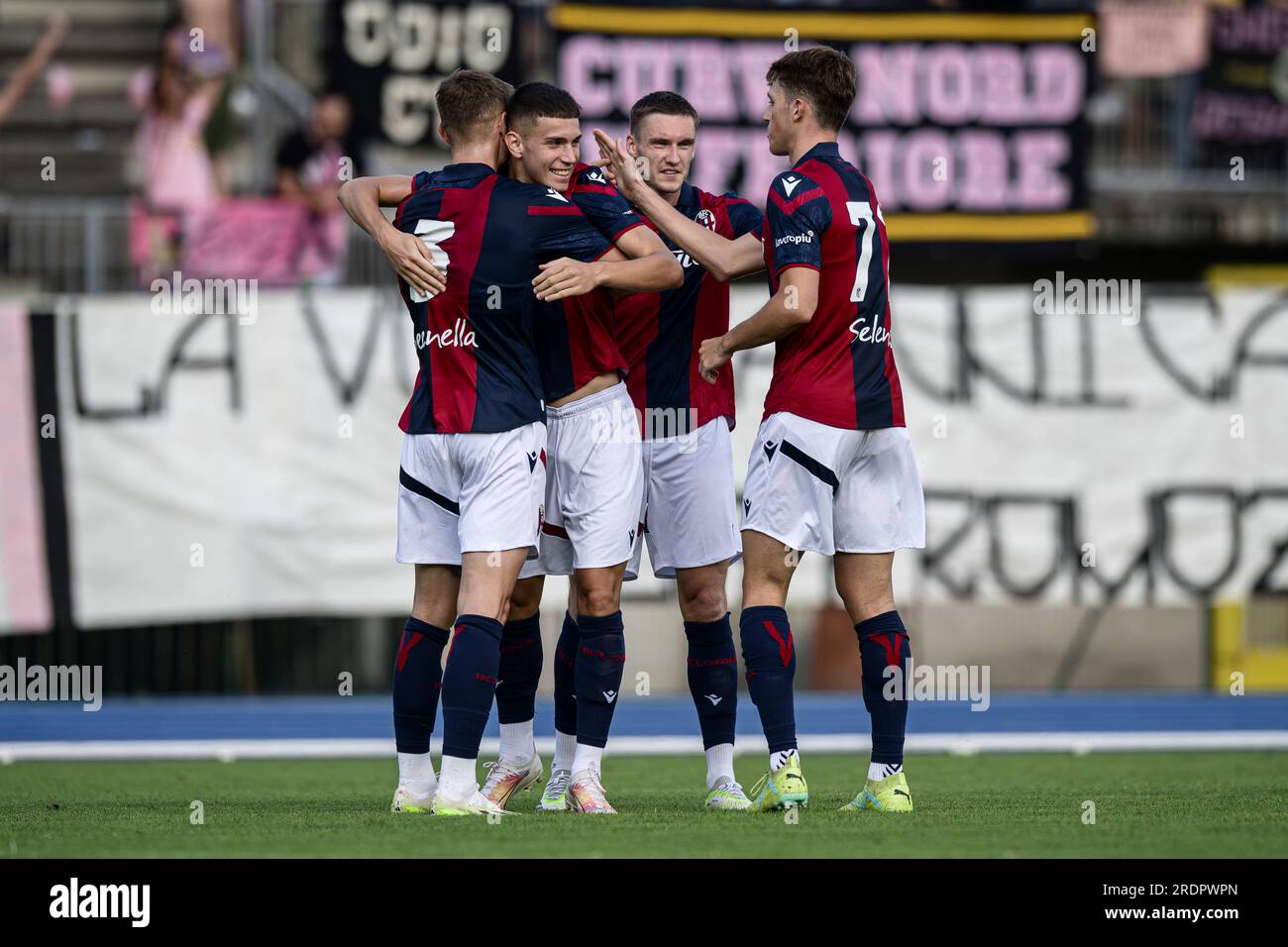 Antonio Raimondo of Bologna FC celebrates with his teammates after scoring a goal during the pre-season friendly football match between Bologna FC and Palermo FC. Stock Photo