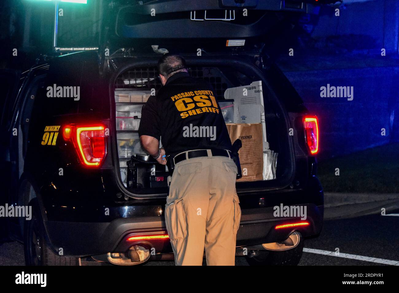Clifton, USA. 22nd July 2023. Crime scene investigator gathers evidence