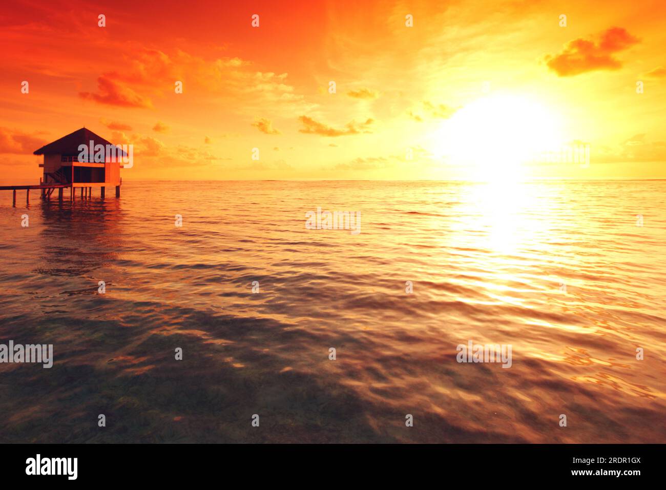 resort maldivian houses on sunrise Stock Photo - Alamy