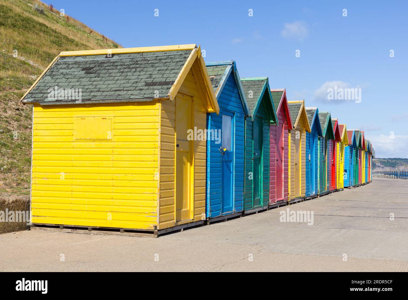 Colourful beach huts at Whitby Stock Photo - Alamy