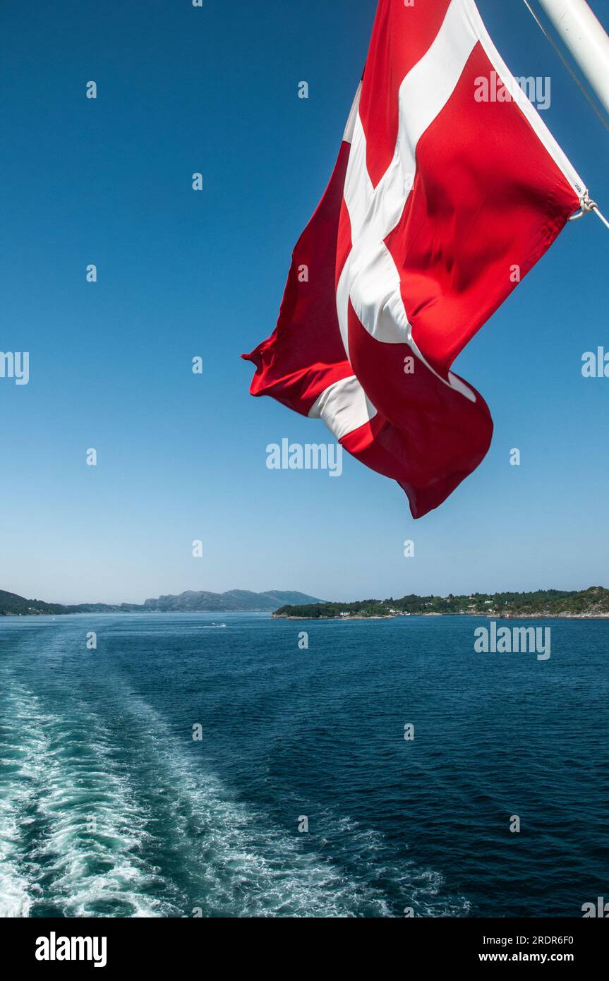 Around Stavanger - Norwegian flag flying on the rear of ferry boat Stock Photo
