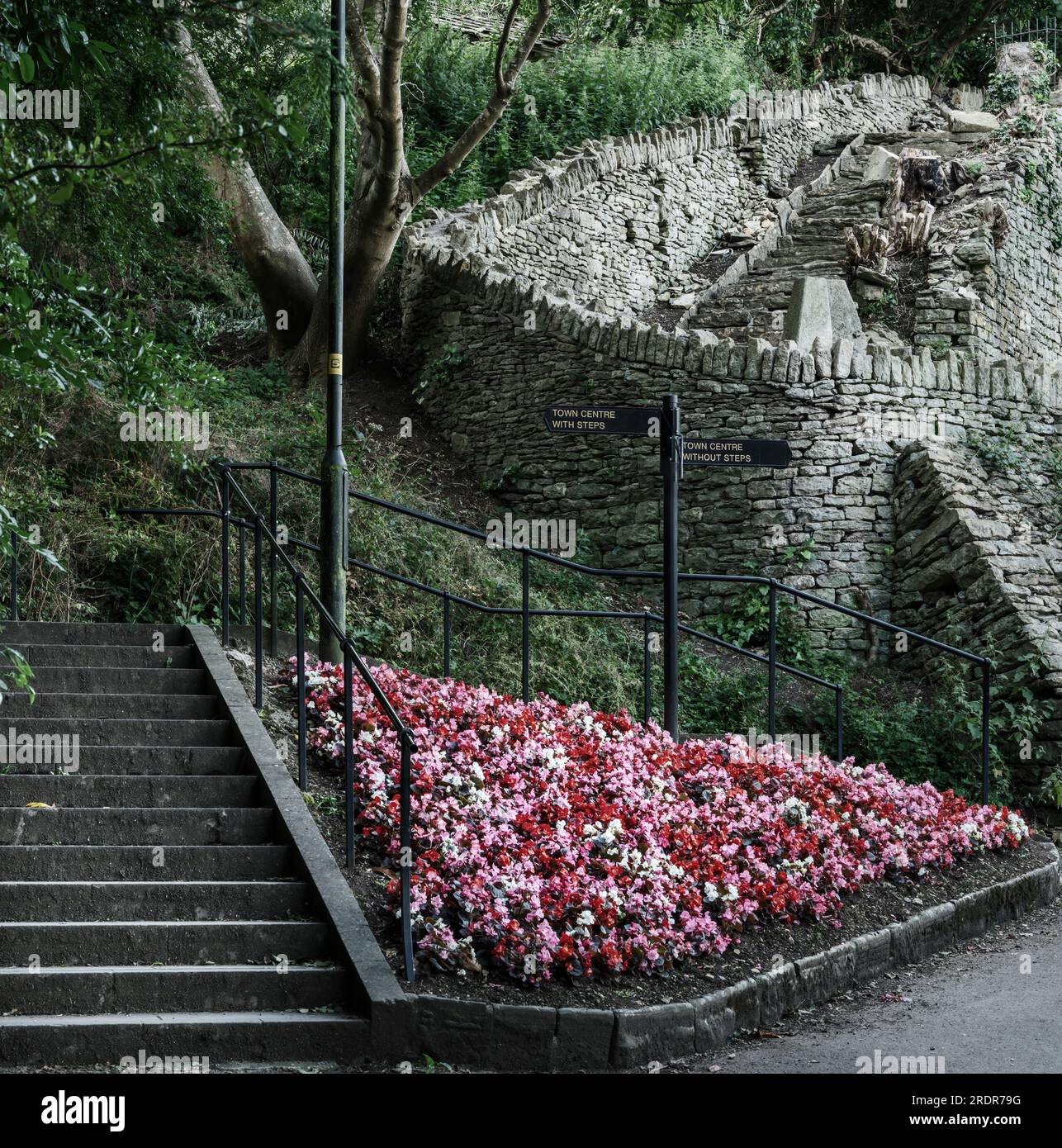 The steps that lead up to the historic abbey and town centre in the Wiltshire market town of Malmesbury. This image also shows a set of ancient steps Stock Photo