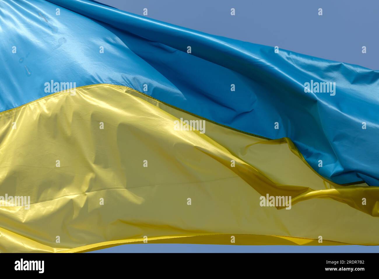 View of the national flag of Ukraine waving in the wind Stock Photo