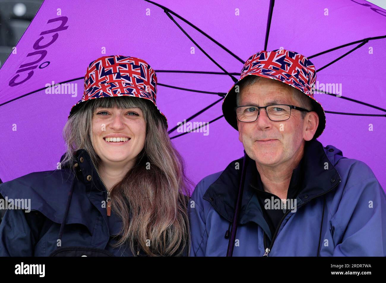 Cricket fans sheltering from the drizzle ahead of the LV= Insurance