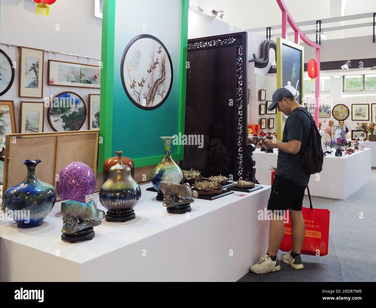 BEIJING, CHINA - JULY 23, 2023 - Visitors visit the 2023 China (Beijing) International Fine Ceramics Exhibition in Beijing, China, July 23, 2023. Stock Photo