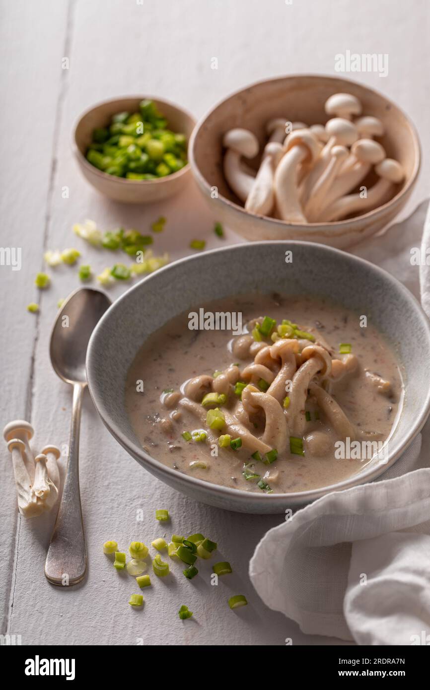 Vegan mushroom shimeji soup as Japanese appetizer. Japanese mushroom