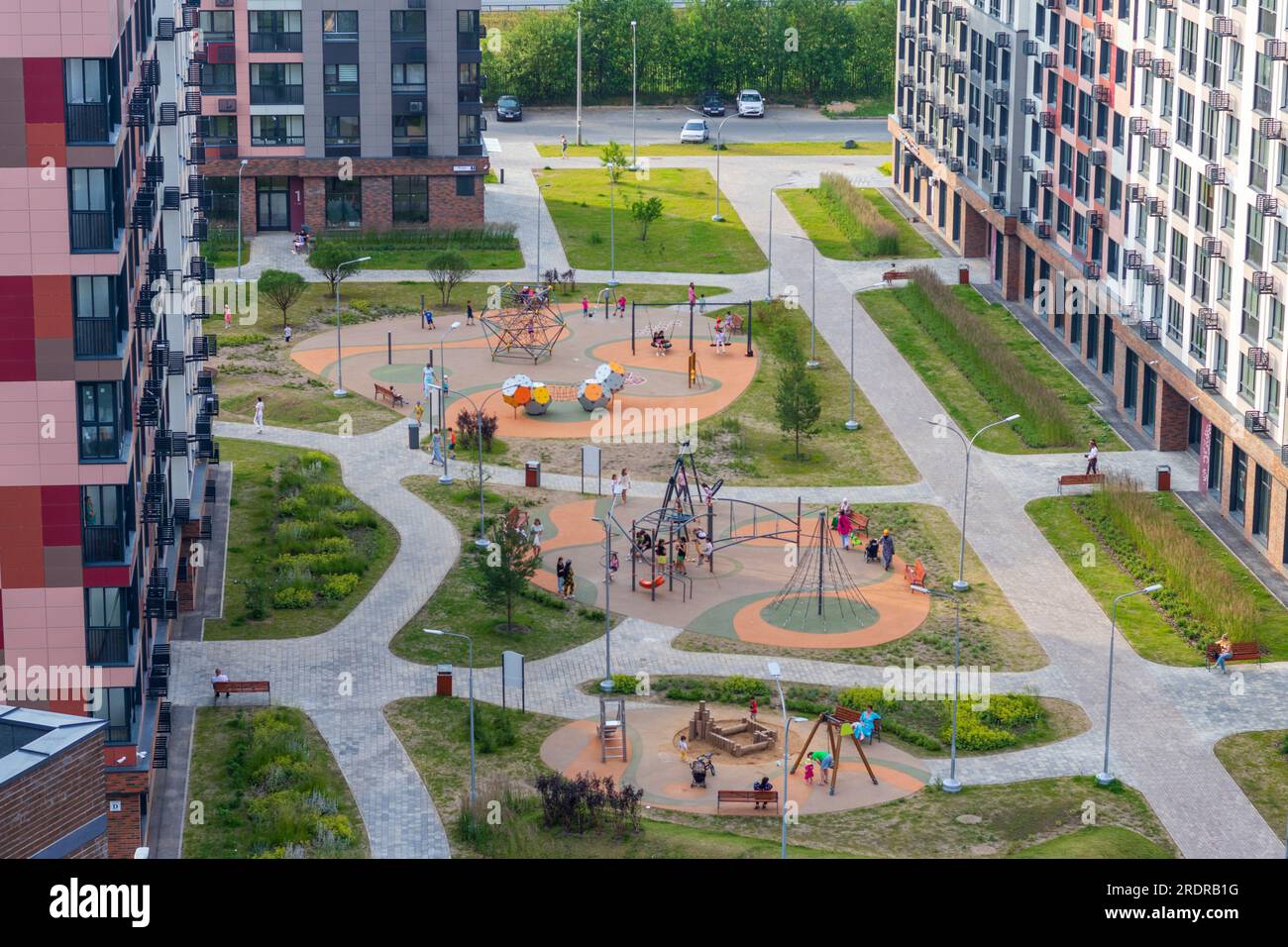 Kids playing on the playground hi-res stock photography and images - Alamy