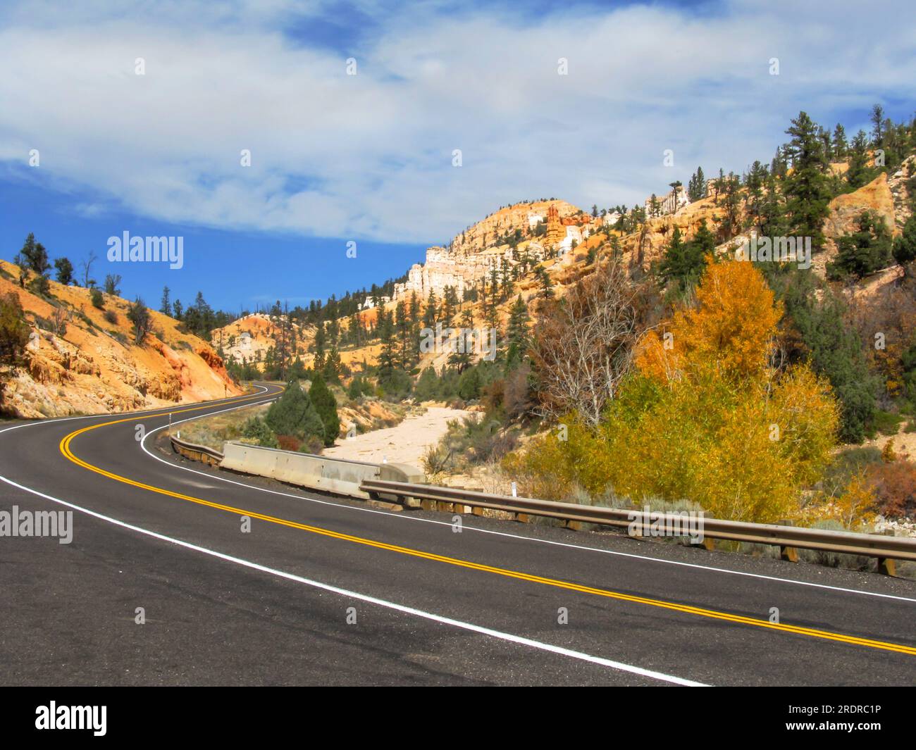 Road through the high-altitude desert of southern Utah, connecting the small town of Escalante with Bryce Canyon National Park. Stock Photo